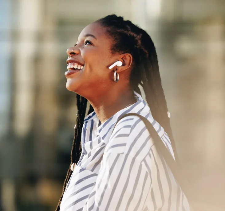 Professional using wireless earbuds representing digital communication